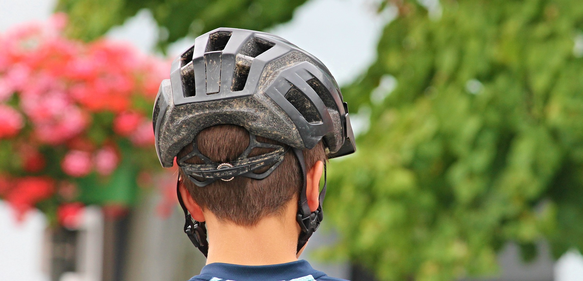 Boy wearing a bike helmet