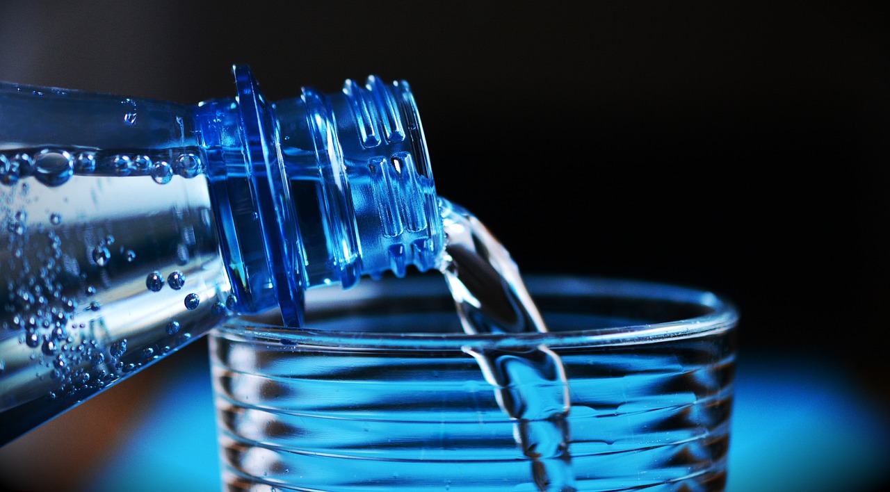 Bottle pouring water